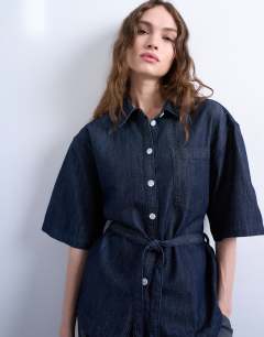 Model wearing Denim tie back oversized boxy shirt in