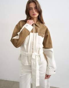 Model wearing Denim two-toned cinch jacket in ecru and brown