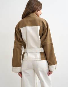 Model wearing Denim two-toned cinch jacket in ecru and brown