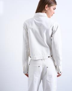 Model wearing Denim utility jacket in ecru