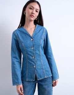 Model wearing Denim v neck cinched in shirt in mid blue