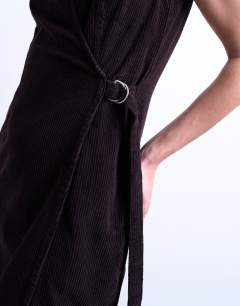 Model wearing Denim wrap mini dress in chocolate