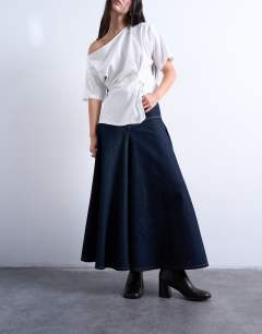 Model wearing Denim yoke front maxi skirt in indigo rinse