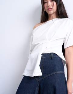 Model wearing Denim yoke front maxi skirt in indigo rinse