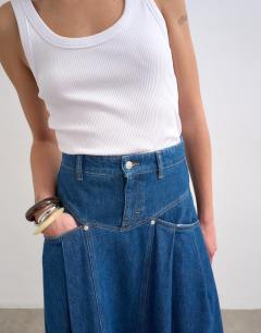 Model wearing Denim yoke pleated maxi skirt in rich blue