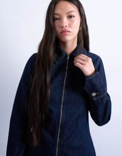 Model wearing Denim zip through long sleeve mini dress in indigo