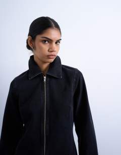 Model wearing Denim zip through long sleeve mini dress in washed black