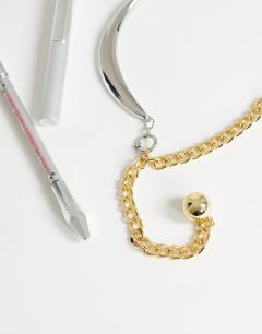 Model wearing Denzel chunky asymmetric lariat necklace with ball in gold and silver