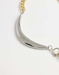 Model wearing Denzel chunky asymmetric lariat necklace with ball in gold and silver