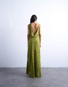 Model wearing Devore occasion twist shoulder midi dress in green