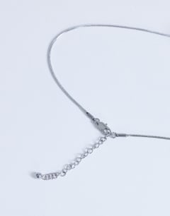 Model wearing Dolly waterproof necklace with ball in stainless silver