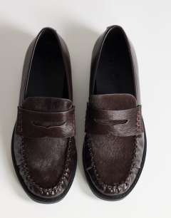 Model wearing Dominic ruched loafer in chocolate hair on real leather