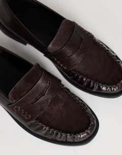 Model wearing Dominic ruched loafer in chocolate hair on real leather