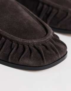 Model wearing Dora real suede ruched loafer in chocolate