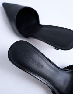 Model wearing Dorota kitten heel pointed mule in black