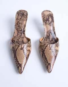 Model wearing Dorota kitten heel pointed mule in snake