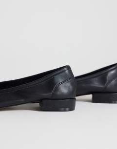 Model wearing Dottie block heel ballet shoe in black