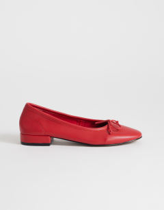 Model wearing Dottie block heel ballet shoe in red