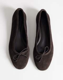 Model wearing Dottie real suede block heel ballet shoe in chocolate