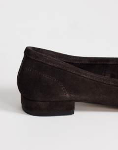 Model wearing Dottie real suede block heel ballet shoe in chocolate