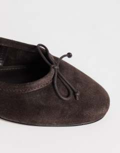 Model wearing Dottie real suede block heel ballet shoe in chocolate