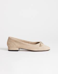 Model wearing Dottie real suede block heel ballet shoe in taupe