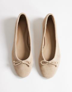 Model wearing Dottie real suede block heel ballet shoe in taupe