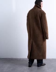 Model wearing Double breasted borg longline coat in brown