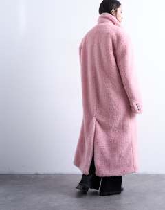 Model wearing Double breasted borg longline coat in pink