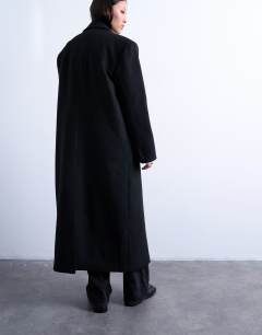 Model wearing Double breasted mensy overcoat with wool in black