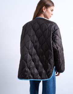 Model wearing Double layer fronted liner jacket in brown