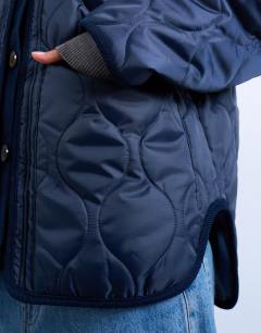 Model wearing Double layer fronted liner jacket in navy