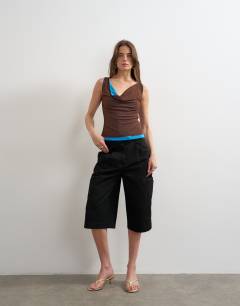 Model wearing Double layer mesh cowl neck top in blue and brown