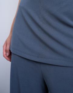 Model wearing Double layer mock skirt trousers in charcoal grey