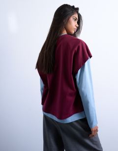 Model wearing Double layer skater tee in blue and burgundy