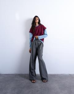 Model wearing Double layer skater tee in blue and burgundy