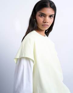 Model wearing Double layer skater tee in green and ecru