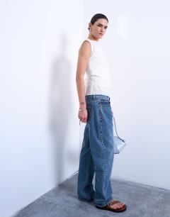 Model wearing Double layer sleeveless tunic top in ivory