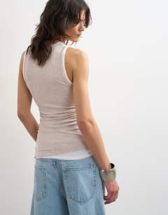 Model wearing Double layer tank top in oat
