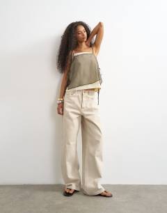 Model wearing Double layer tie side cami in brown
