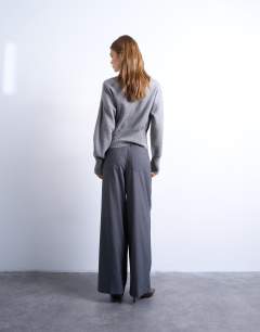 Model wearing Double pleat high rise wide leg trouser in charcoal