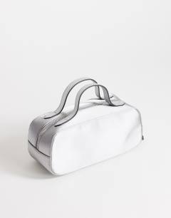 Model wearing Dover medium satin top handle grab bag in grey