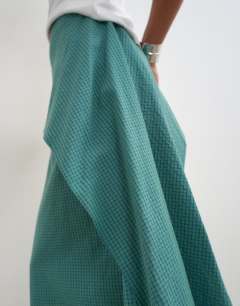 Model wearing Drape detail maxi skirt in green and blue check