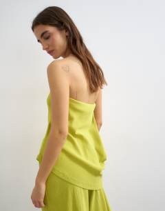 Model wearing Drape detail textured bandeau co-ord top in green