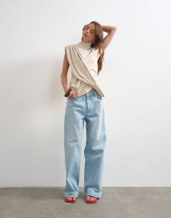 Model wearing Drape front marl tunic top in oat