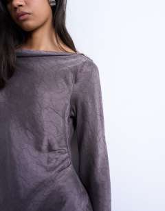 Model wearing Drape neck mini dress in charcoal mauve cupro jacquard