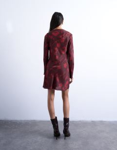 Model wearing Drape neck mini dress in wine floral