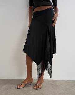 Model wearing Draped detail fringe skirt in black