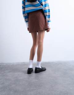 Model wearing Draped tuckside mini skirt in chocolate brown