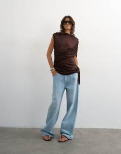 Model wearing Draped wrap high cap sleeve top in chocolate brown